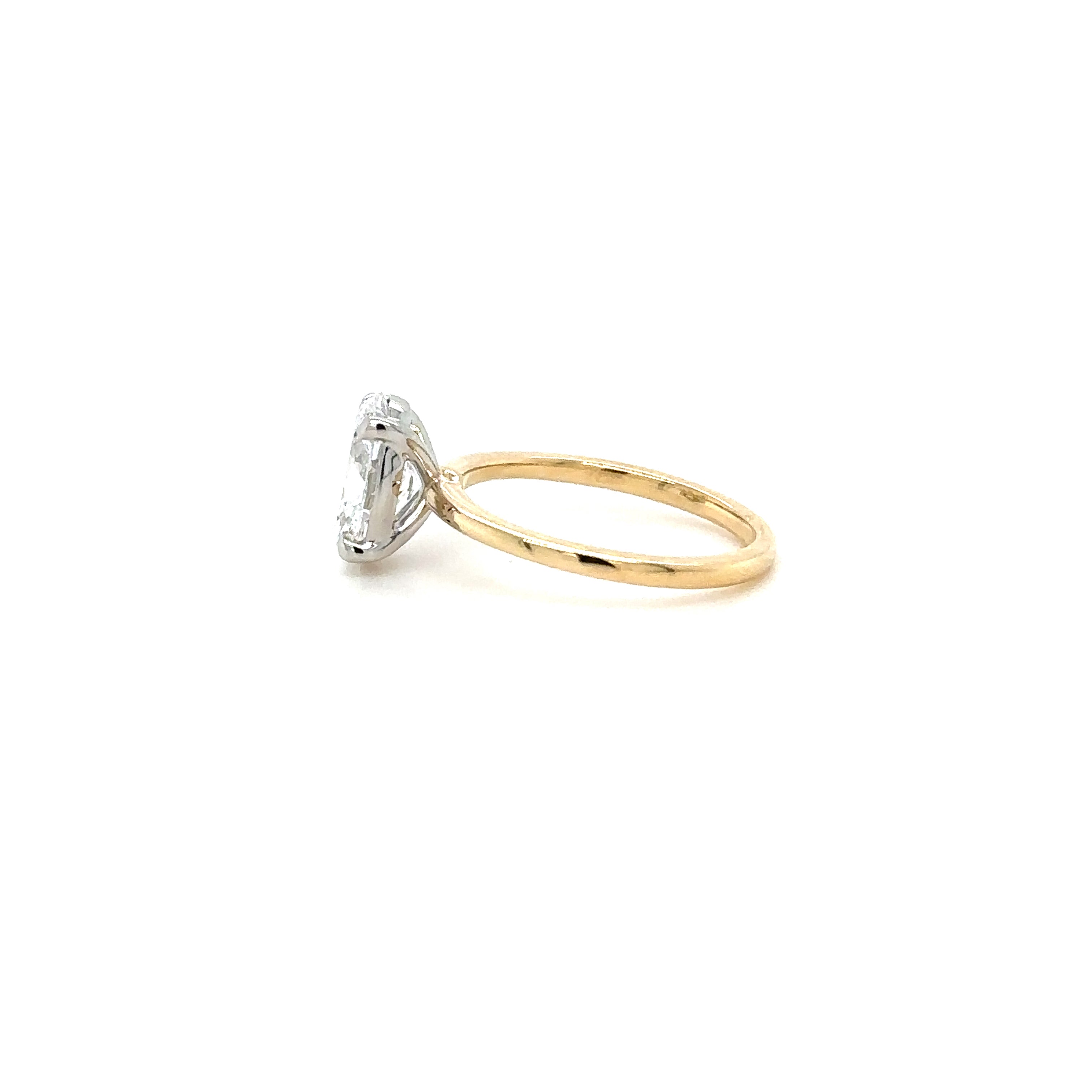 1.6mm Lowest Solitaire Diamond Engagement Ring, Oval cut. Side View. Cairn Diamonds