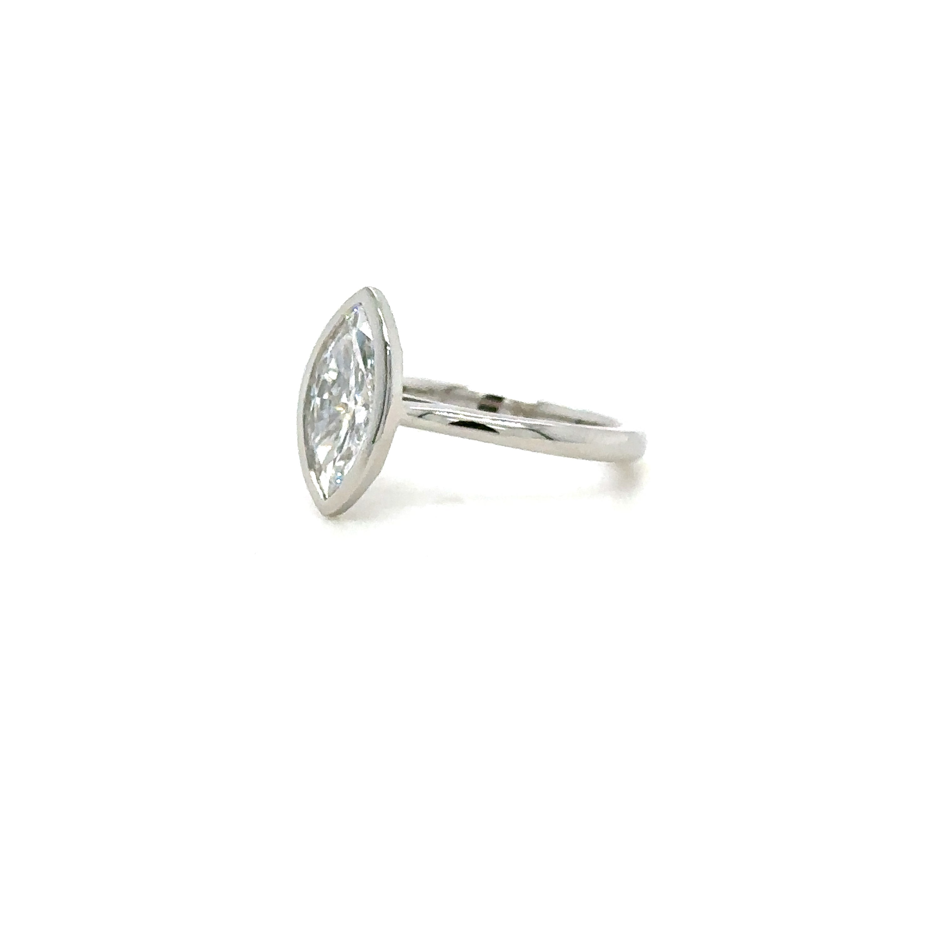 Rub Over (Bezel Set) Solitaire Diamond Ring in Platinum. Partial Side View. 