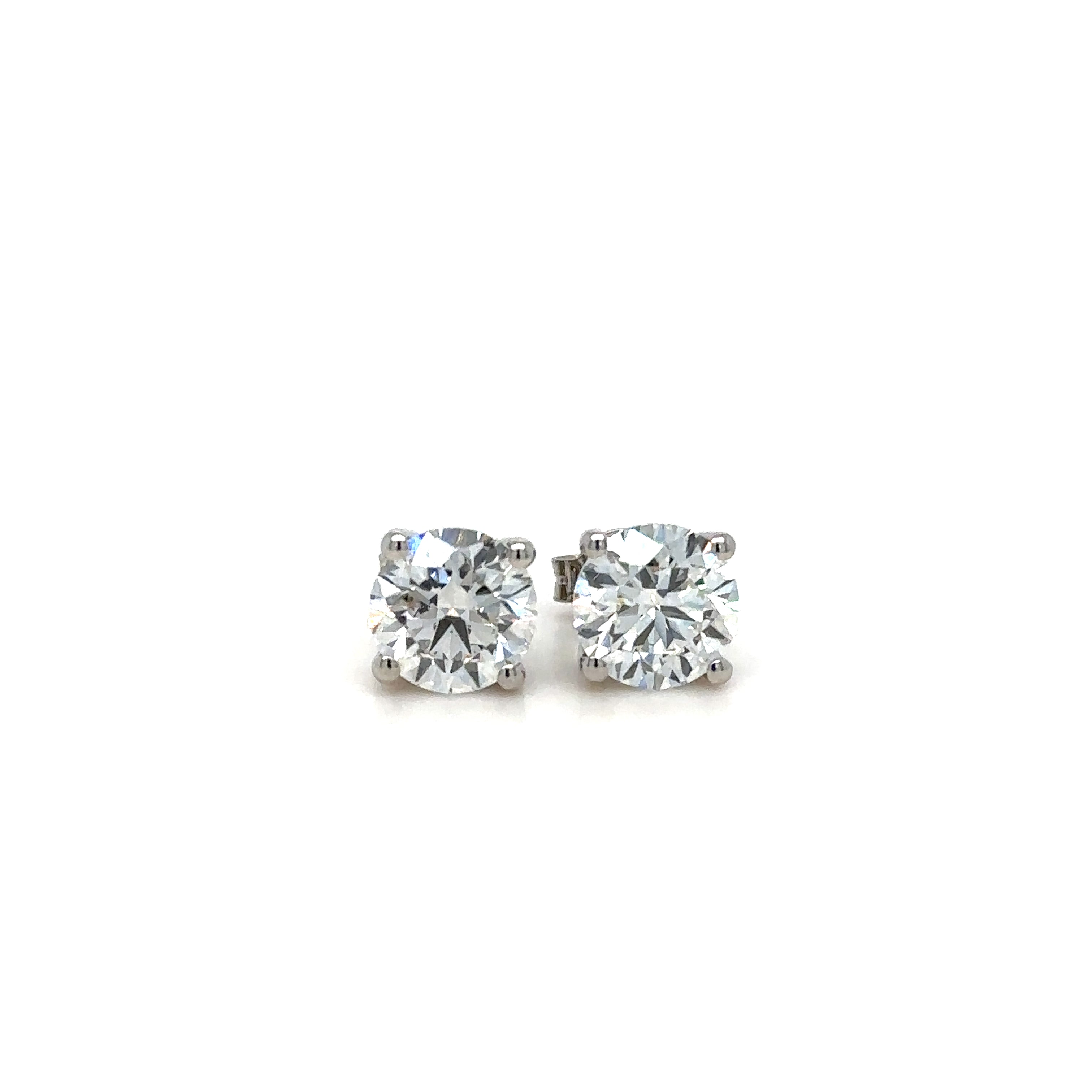 Natural Diamond Stud Earrings 4ct Total in Platinum. Front View.