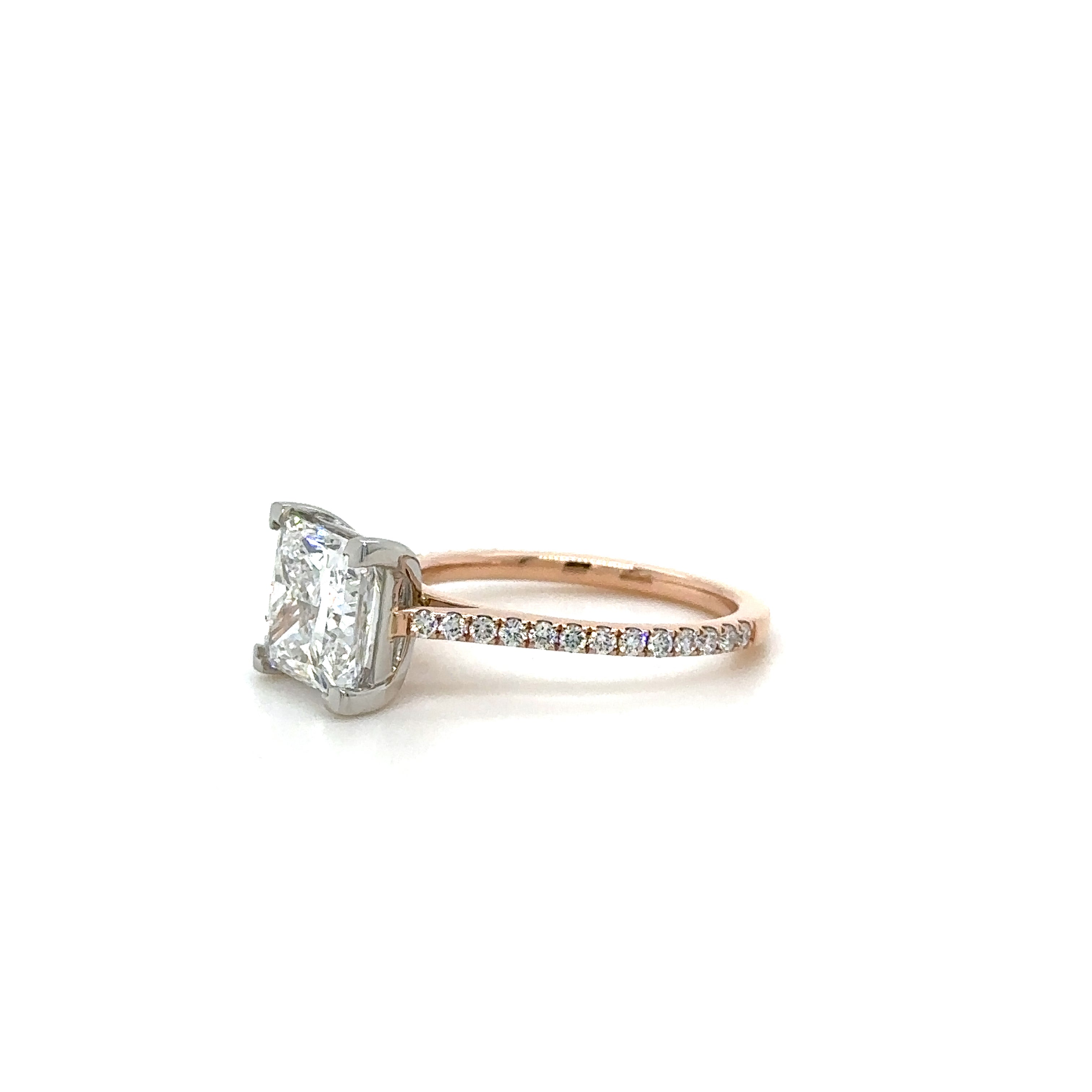 1.6mm Pave Diamond Engagement Ring set with a princess cut. Partial Side View by Cairn Diamonds