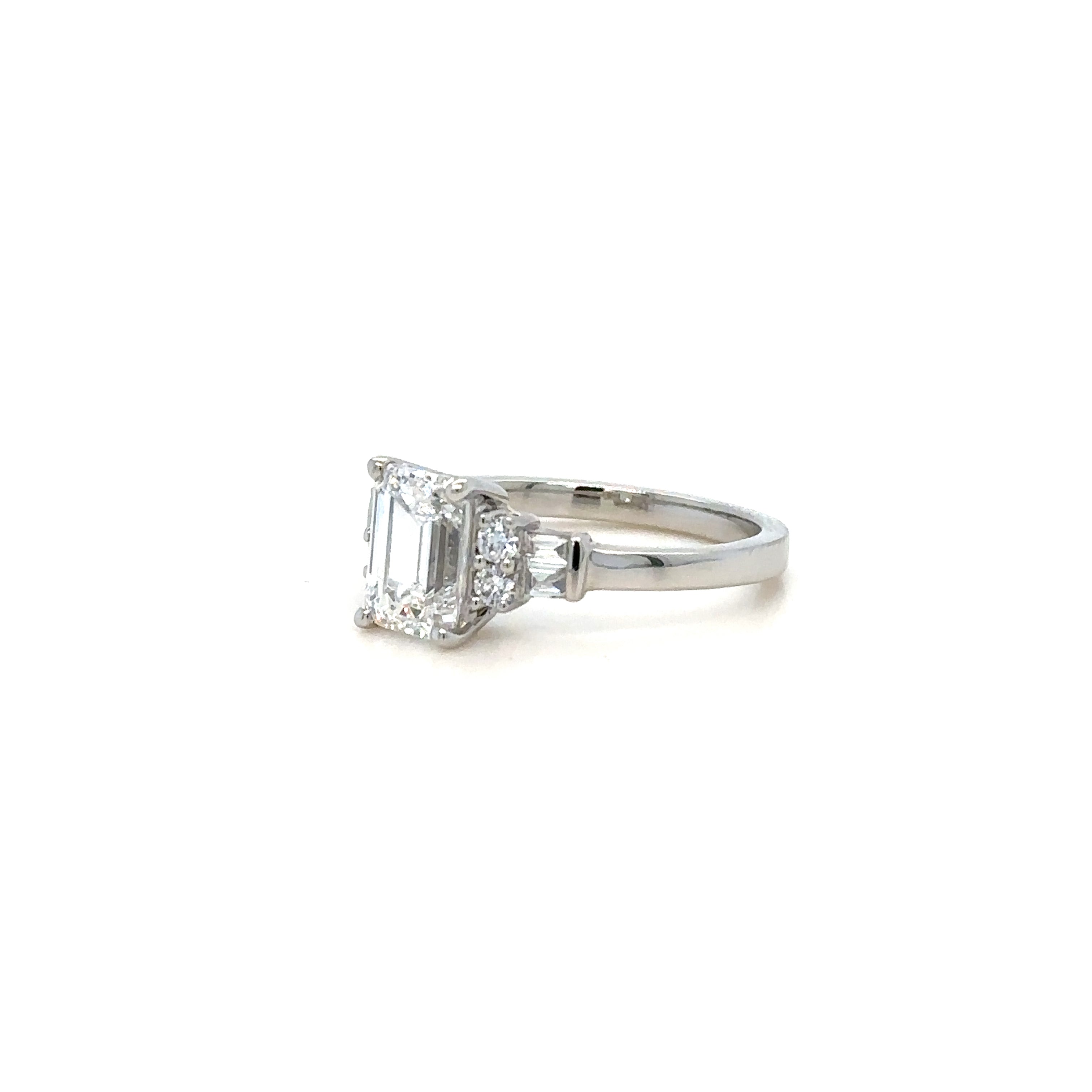 Baguette and Round Side Diamond Ring in Platinum. Partial Side View.